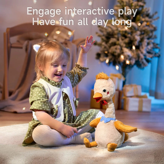 Smiling young girl sitting on a rug interacting with a plush dancing chicken toy, in a cozy holiday setting with Christmas tree and gift boxes in the background. Text reads 'Engage interactive play – Have fun all day long'.