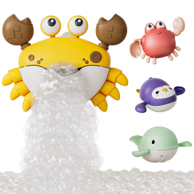 A yellow crab-shaped bath toy releases a stream of bubbles from its mouth, surrounded by three additional floating bath toys: a red crab, a purple penguin, and a green whale. The toys are made of smooth plastic and feature cute, cartoon-like expressions, designed to make bath time fun and engaging for babies and toddlers.