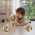 Child lying on the floor smiling while petting the battery-operated toy dog; inset images show touching the dog’s head to wag its tail and lick its tongue, and touching its collar to make it bark ‘Woof~ woof~,’ with overlay text ‘Non-toxic, sturdy construction for long-lasting play.’
