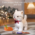 Adorable white plush Interactive toy puppy with glasses and red bow tie standing on a rug, surrounded by a toy food bowl, green bone, leash remote, and rope ball. Musical notes float around, illustrating the toy's ability to sing, walk, and lick. Background shows cozy indoor setting with warm lights and a lamp.