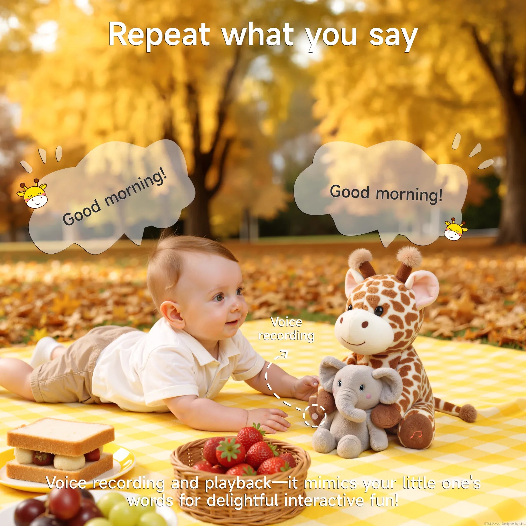 Baby lying on a picnic blanket in a park during autumn, interacting with a talking giraffe and elephant stuffed animal toy that repeats phrases like “Good morning!” using its voice recording and playback feature; picnic food and colorful leaves surround the scene.
