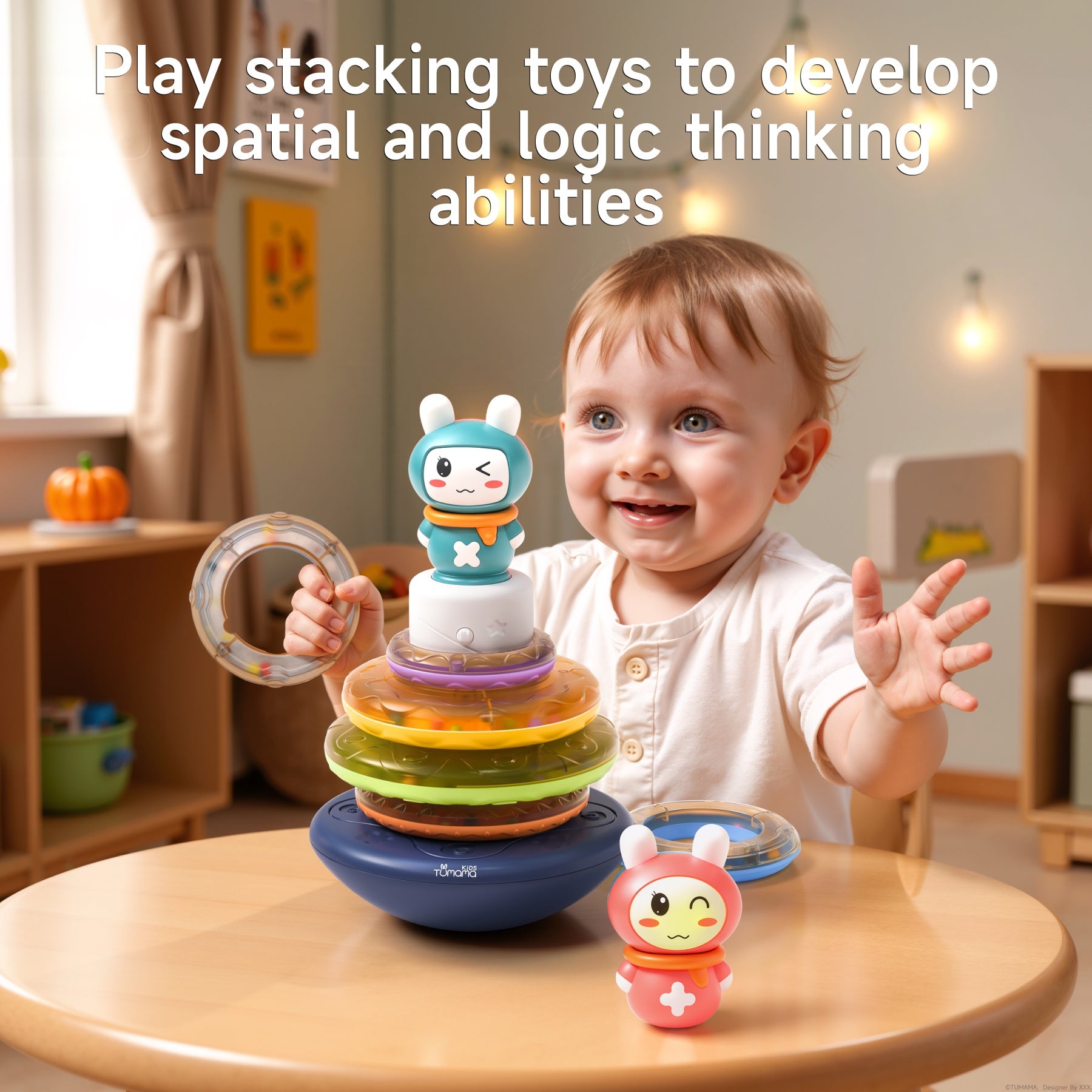Baby playing with a musical stacking rings toy, stacking colorful transparent rings