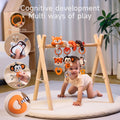 Cute fox spiral toy fixed on baby gym stand, baby is playing with the plush toy hanging from the spiral toy