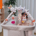 Video shows baby playing with Bunny Plush Spiral Car Seat Toy Set