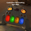 Close-up of baby play gym light-up keyboard with customized soft breathing light effect in red, green, yellow, and blue colors.