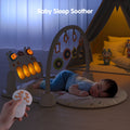 Baby sleeping peacefully on dinosaur-themed play gym with glowing light-up keyboard, hanging rattles, and remote control sleep soother mode.