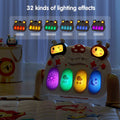 Baby gym musical keyboard with cartoon characters and 32 colorful lighting effects including red, yellow, green, cyan, blue, and purple, displayed on a play mat.